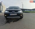 Черный Мицубиси Аутлендер, объемом двигателя 3 л и пробегом 155 тыс. км за 9800 $, фото 10 на Automoto.ua