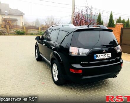 Черный Мицубиси Аутлендер, объемом двигателя 3 л и пробегом 230 тыс. км за 8999 $, фото 3 на Automoto.ua