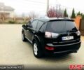 Черный Мицубиси Аутлендер, объемом двигателя 3 л и пробегом 230 тыс. км за 8999 $, фото 3 на Automoto.ua