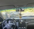Черный Мицубиси Аутлендер, объемом двигателя 2.4 л и пробегом 400 тыс. км за 4400 $, фото 11 на Automoto.ua