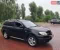 Чорний Міцубісі Аутлендер, об'ємом двигуна 2.4 л та пробігом 262 тис. км за 7300 $, фото 1 на Automoto.ua