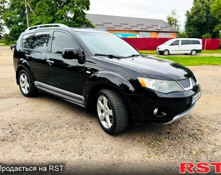 Черный Мицубиси Аутлендер, объемом двигателя 3 л и пробегом 200 тыс. км за 9799 $, фото 5 на Automoto.ua