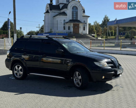 Чорний Міцубісі Аутлендер, об'ємом двигуна 2 л та пробігом 280 тис. км за 7500 $, фото 3 на Automoto.ua