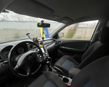 Черный Мицубиси Аутлендер, объемом двигателя 2 л и пробегом 430 тыс. км за 4300 $, фото 3 на Automoto.ua