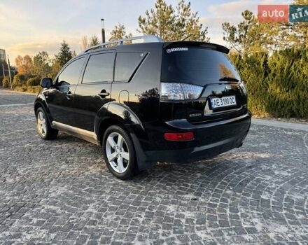 Черный Мицубиси Аутлендер, объемом двигателя 3 л и пробегом 205 тыс. км за 11300 $, фото 2 на Automoto.ua