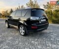 Черный Мицубиси Аутлендер, объемом двигателя 3 л и пробегом 205 тыс. км за 11300 $, фото 2 на Automoto.ua