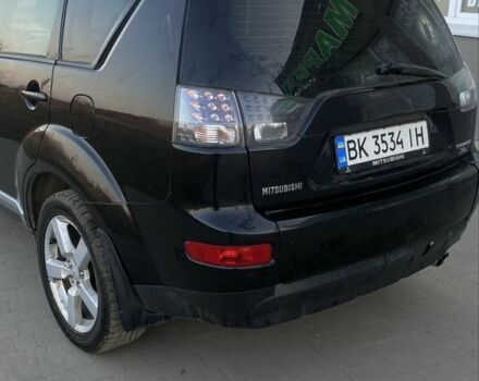 Чорний Міцубісі Аутлендер, об'ємом двигуна 2.4 л та пробігом 200 тис. км за 8300 $, фото 3 на Automoto.ua