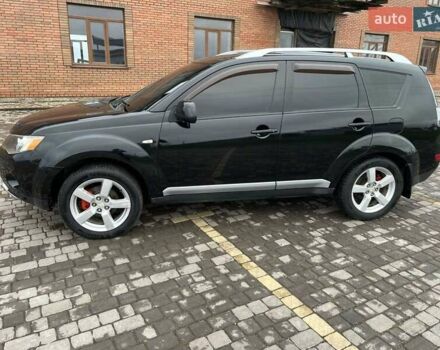Черный Мицубиси Аутлендер, объемом двигателя 3 л и пробегом 200 тыс. км за 7999 $, фото 11 на Automoto.ua