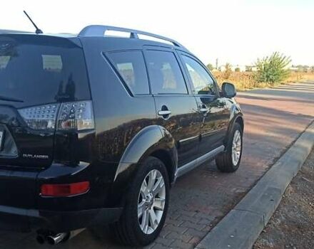 Черный Мицубиси Аутлендер, объемом двигателя 1.97 л и пробегом 244 тыс. км за 9000 $, фото 4 на Automoto.ua