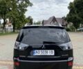 Черный Мицубиси Аутлендер, объемом двигателя 2.4 л и пробегом 200 тыс. км за 7500 $, фото 6 на Automoto.ua
