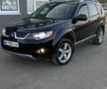 Чорний Міцубісі Аутлендер, об'ємом двигуна 2.4 л та пробігом 200 тис. км за 8300 $, фото 1 на Automoto.ua