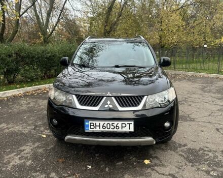 Черный Мицубиси Аутлендер, объемом двигателя 2.4 л и пробегом 230 тыс. км за 8500 $, фото 12 на Automoto.ua