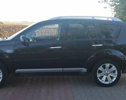 Черный Мицубиси Аутлендер, объемом двигателя 1.97 л и пробегом 244 тыс. км за 9000 $, фото 9 на Automoto.ua