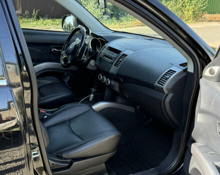 Черный Мицубиси Аутлендер, объемом двигателя 3 л и пробегом 180 тыс. км за 11200 $, фото 17 на Automoto.ua