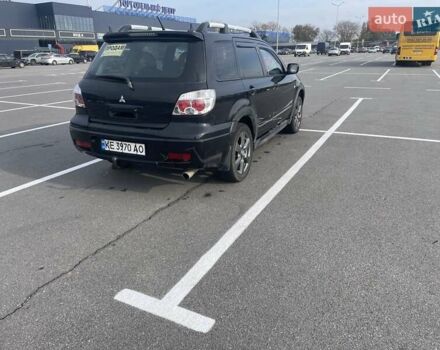 Черный Мицубиси Аутлендер, объемом двигателя 2.38 л и пробегом 180 тыс. км за 6900 $, фото 3 на Automoto.ua