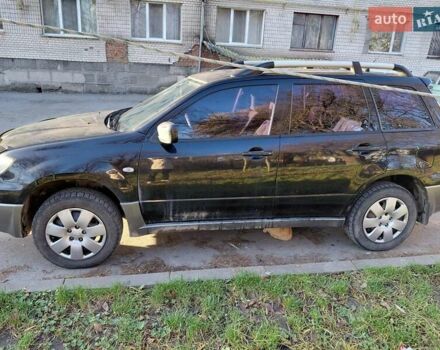 Чорний Міцубісі Аутлендер, об'ємом двигуна 2 л та пробігом 260 тис. км за 5500 $, фото 2 на Automoto.ua