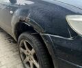 Чорний Міцубісі Аутлендер, об'ємом двигуна 2.4 л та пробігом 267 тис. км за 6000 $, фото 2 на Automoto.ua