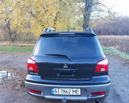 Мицубиси Аутлендер 2007 в Мироновке на Automoto.ua Черный Мицубиси Аутлендер, объемом двигателя 2 л и пробегом 278 тыс. км за 6500 $, фото 5 на Automoto.ua
