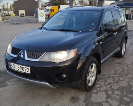 Черный Мицубиси Аутлендер, объемом двигателя 2 л и пробегом 290 тыс. км за 4900 $, фото 2 на Automoto.ua