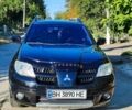 Черный Мицубиси Аутлендер, объемом двигателя 2.38 л и пробегом 164 тыс. км за 8000 $, фото 5 на Automoto.ua