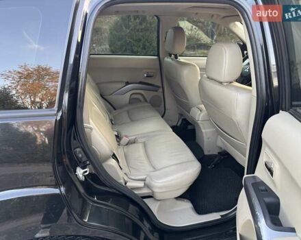 Черный Мицубиси Аутлендер, объемом двигателя 3 л и пробегом 205 тыс. км за 11300 $, фото 23 на Automoto.ua