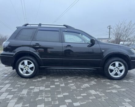 Чорний Міцубісі Аутлендер, об'ємом двигуна 2.4 л та пробігом 202 тис. км за 5800 $, фото 8 на Automoto.ua