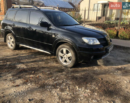 Черный Мицубиси Аутлендер, объемом двигателя 2.4 л и пробегом 260 тыс. км за 7200 $, фото 8 на Automoto.ua
