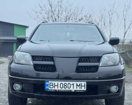 Чорний Міцубісі Аутлендер, об'ємом двигуна 2.38 л та пробігом 202 тис. км за 5800 $, фото 1 на Automoto.ua