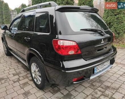 Черный Мицубиси Аутлендер, объемом двигателя 2 л и пробегом 180 тыс. км за 6000 $, фото 7 на Automoto.ua
