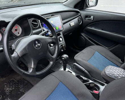 Чорний Міцубісі Аутлендер, об'ємом двигуна 2.38 л та пробігом 175 тис. км за 6000 $, фото 5 на Automoto.ua