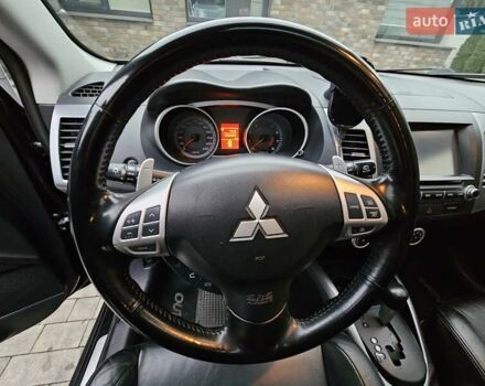 Черный Мицубиси Аутлендер, объемом двигателя 3 л и пробегом 238 тыс. км за 10800 $, фото 30 на Automoto.ua
