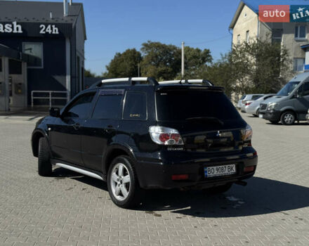 Чорний Міцубісі Аутлендер, об'ємом двигуна 2 л та пробігом 280 тис. км за 7500 $, фото 5 на Automoto.ua