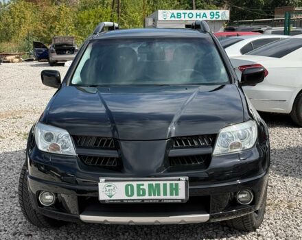 Черный Мицубиси Аутлендер, объемом двигателя 2.4 л и пробегом 258 тыс. км за 6300 $, фото 3 на Automoto.ua
