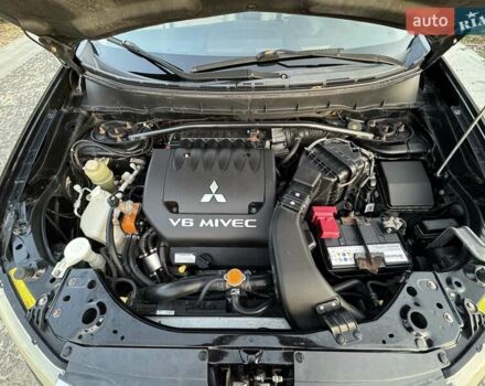 Черный Мицубиси Аутлендер, объемом двигателя 3 л и пробегом 205 тыс. км за 11300 $, фото 30 на Automoto.ua