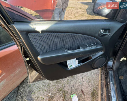 Черный Мицубиси Аутлендер, объемом двигателя 2 л и пробегом 258 тыс. км за 2200 $, фото 15 на Automoto.ua