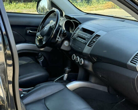 Черный Мицубиси Аутлендер, объемом двигателя 3 л и пробегом 180 тыс. км за 11200 $, фото 18 на Automoto.ua