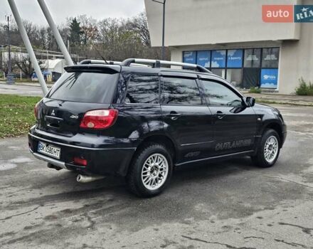 Черный Мицубиси Аутлендер, объемом двигателя 2 л и пробегом 290 тыс. км за 4000 $, фото 9 на Automoto.ua