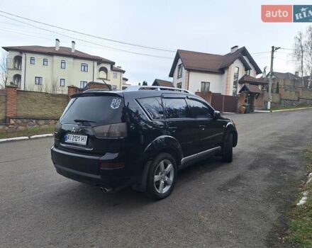 Черный Мицубиси Аутлендер, объемом двигателя 3 л и пробегом 220 тыс. км за 9000 $, фото 5 на Automoto.ua