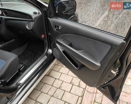 Черный Мицубиси Аутлендер, объемом двигателя 2 л и пробегом 180 тыс. км за 6000 $, фото 12 на Automoto.ua