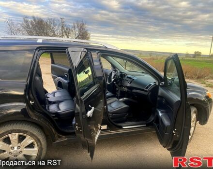 Черный Мицубиси Аутлендер, объемом двигателя 2 л и пробегом 207 тыс. км за 8100 $, фото 3 на Automoto.ua