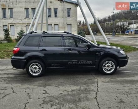 Чорний Міцубісі Аутлендер, об'ємом двигуна 2 л та пробігом 290 тис. км за 4200 $, фото 16 на Automoto.ua
