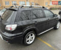 Чорний Міцубісі Аутлендер, об'ємом двигуна 2.4 л та пробігом 169 тис. км за 8000 $, фото 2 на Automoto.ua