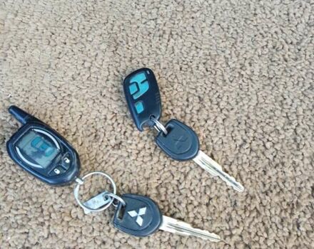 Черный Мицубиси Аутлендер, объемом двигателя 2 л и пробегом 295 тыс. км за 5300 $, фото 21 на Automoto.ua