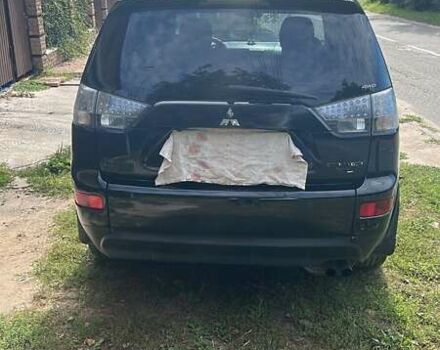 Черный Мицубиси Аутлендер, объемом двигателя 3 л и пробегом 257 тыс. км за 9200 $, фото 5 на Automoto.ua