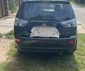 Черный Мицубиси Аутлендер, объемом двигателя 3 л и пробегом 257 тыс. км за 9200 $, фото 5 на Automoto.ua