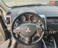 Черный Мицубиси Аутлендер, объемом двигателя 3 л и пробегом 155 тыс. км за 9800 $, фото 11 на Automoto.ua