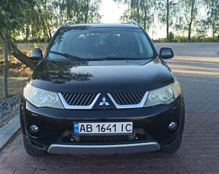 Черный Мицубиси Аутлендер, объемом двигателя 1.97 л и пробегом 244 тыс. км за 9000 $, фото 7 на Automoto.ua