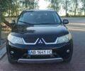 Черный Мицубиси Аутлендер, объемом двигателя 1.97 л и пробегом 244 тыс. км за 9000 $, фото 7 на Automoto.ua