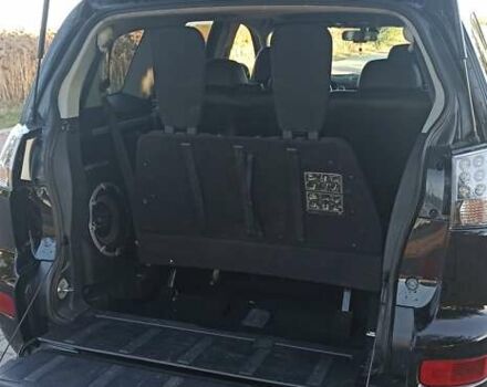 Черный Мицубиси Аутлендер, объемом двигателя 1.97 л и пробегом 244 тыс. км за 9000 $, фото 19 на Automoto.ua