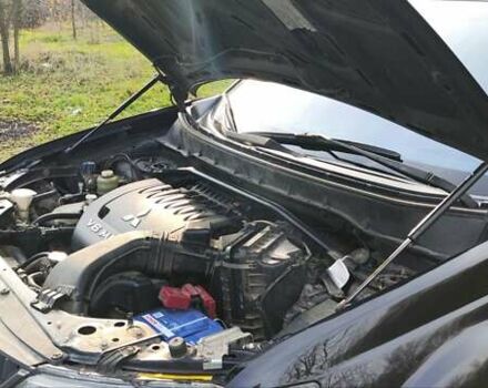 Черный Мицубиси Аутлендер, объемом двигателя 3 л и пробегом 190 тыс. км за 10000 $, фото 19 на Automoto.ua